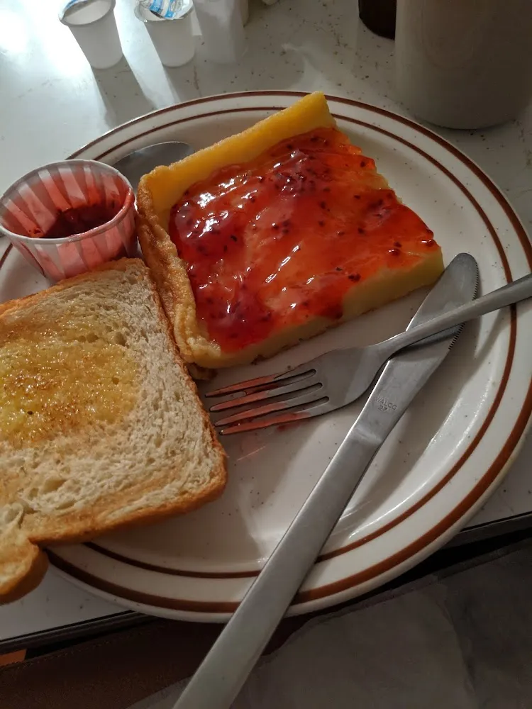 Pannukaku with Nisu Toast and Raspberry Sauce
